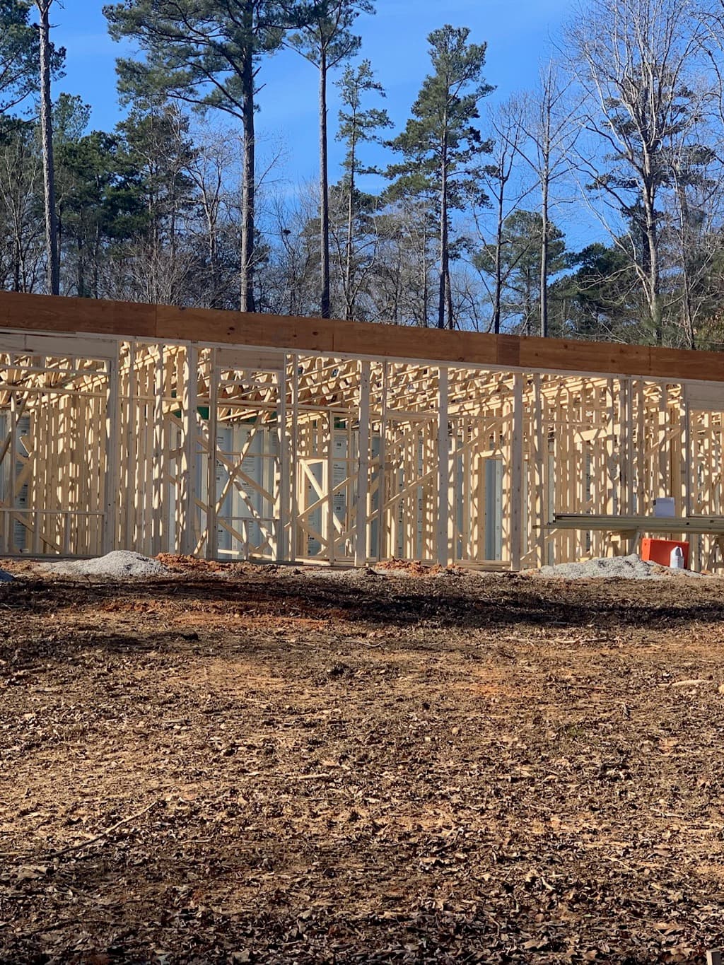 Wall framing in progress on the Riverbend job, Lot 27